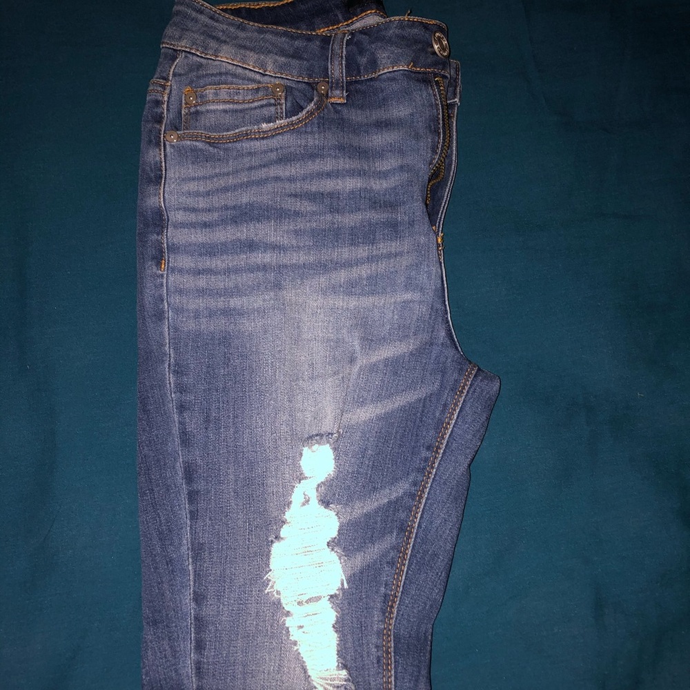 Blue ripped denim smooth jeans